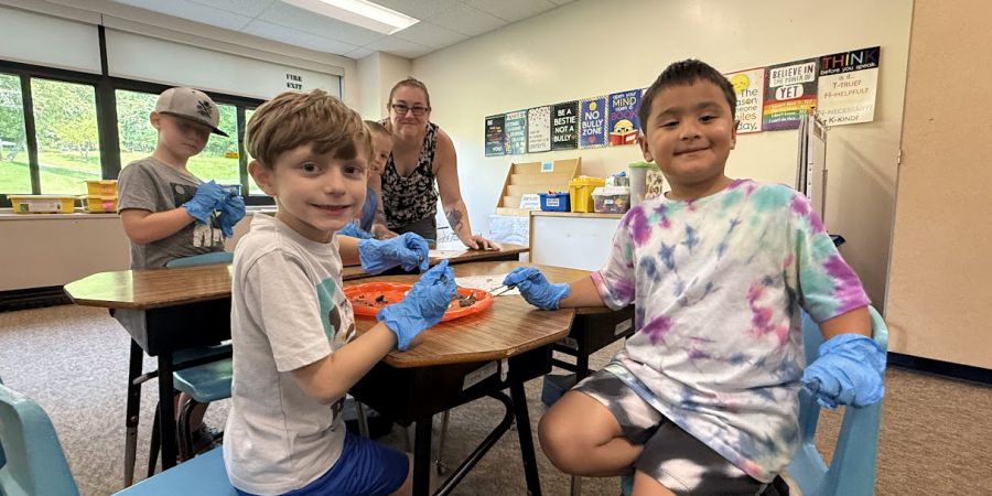 Students dissecting owl pellets in the 2025 summer program