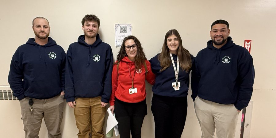 School staff wearing sweatshirts with heartfelt message-4